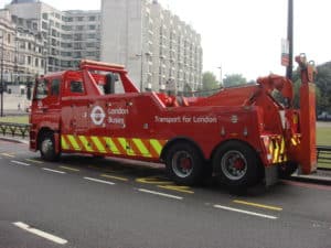 recover service truck in route to tow dispatch